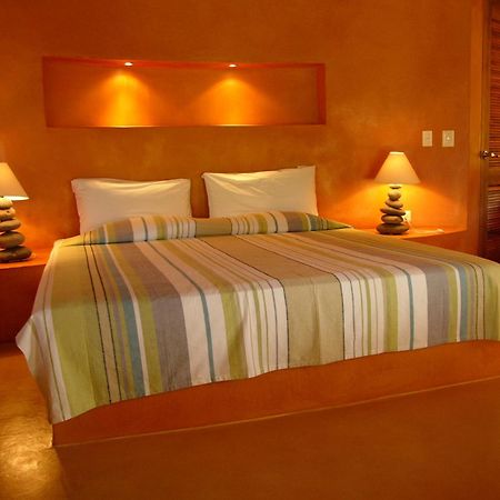 Hotel Playa Negra Paraíso Quarto foto